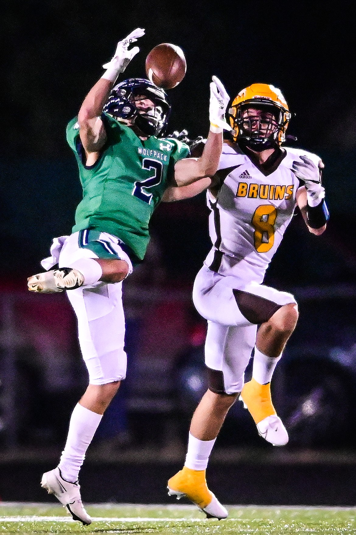 Glacier defensive back Connor Sullivan (2) breaks up a pass intended for Helena Capital wide receiver Tom Carter (8) in the third quarter at Legends Stadium on Friday, Sept. 24. (Casey Kreider/Daily Inter Lake)
