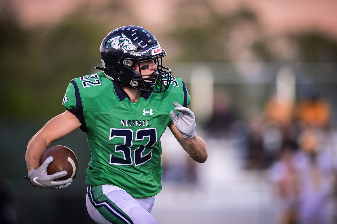 Glacier's Jake Turner (32) returns a kickoff in the first quarter against Helena Capital at Legends Stadium on Friday, Sept. 24. (Casey Kreider/Daily Inter Lake)