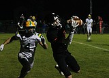 Chemistry lesson: Mead transfer Tucker catches four TD passes as Post Falls pulls away from Lakeland