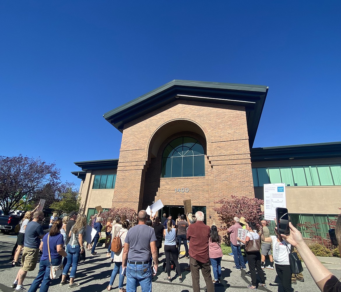A horde of upset parents and residents flocked the Coeur d'Alene School District office after trustees cancelled a meeting on COVID-19 policies. (MADISON HARDY/Press)