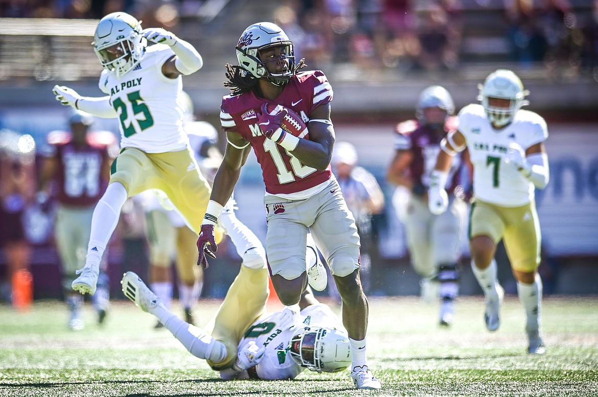 Montana wide receiver Samuel Akem (18) takes a 65-yard touchdown reception to the end zone in the first quarter against Cal Poly at Washington-Grizzly Stadium on Saturday, Sept. 25. (Casey Kreider/Daily Inter Lake)