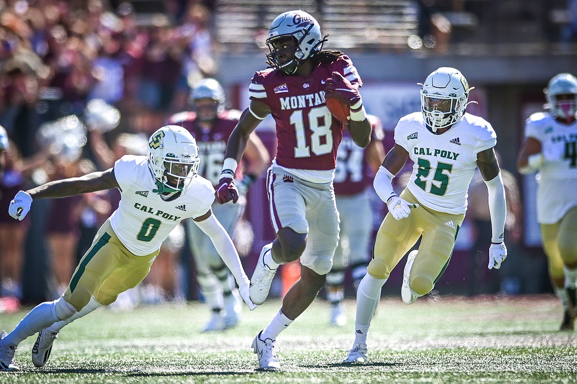 Montana wide receiver Samuel Akem (18) takes a 65-yard touchdown reception to the end zone in the first quarter against Cal Poly at Washington-Grizzly Stadium on Saturday, Sept. 25. (Casey Kreider/Daily Inter Lake)