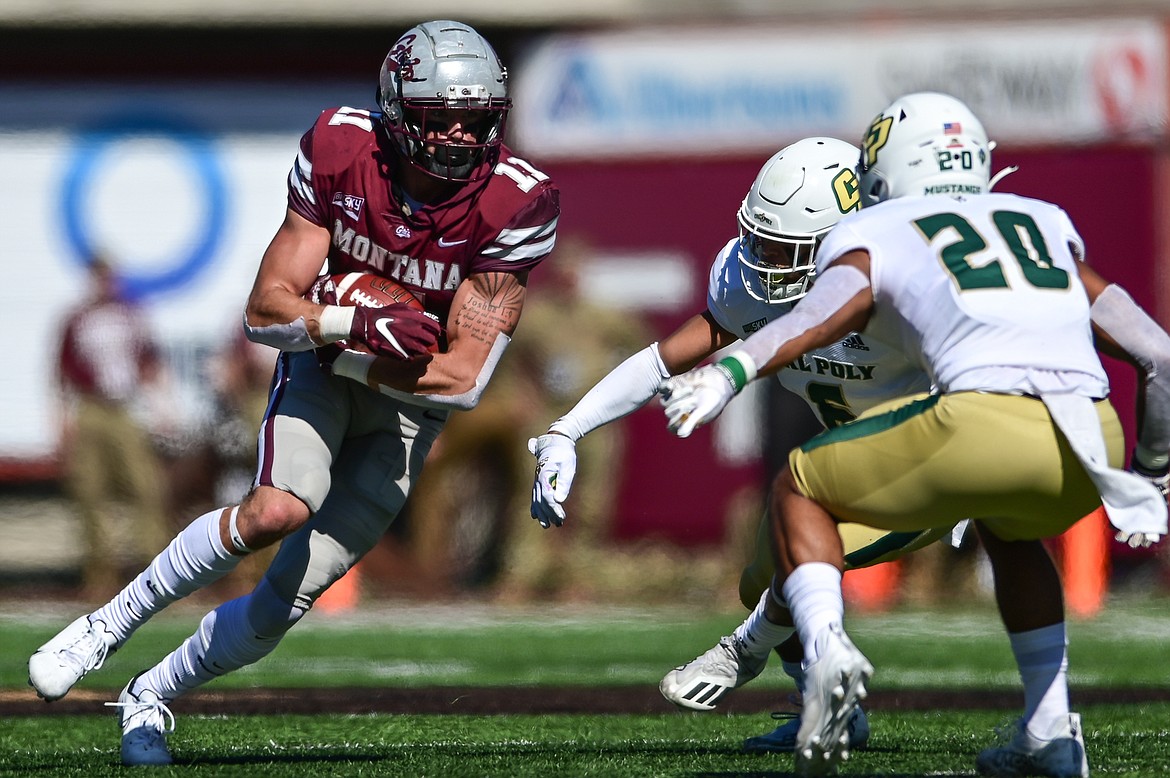 Montana tight end Cole Grossman (11) looks upfield after a reception in the second quarter against Cal Poly at Washington-Grizzly Stadium on Saturday, Sept. 25. (Casey Kreider/Daily Inter Lake)