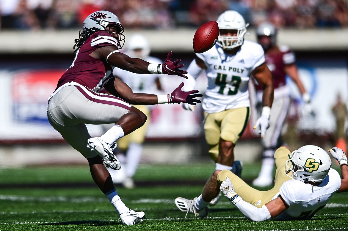 Montana wide receiver Samuel Akem (18) can't hang on to a pass in the second quarter against Cal Poly at Washington-Grizzly Stadium on Saturday, Sept. 25. (Casey Kreider/Daily Inter Lake)