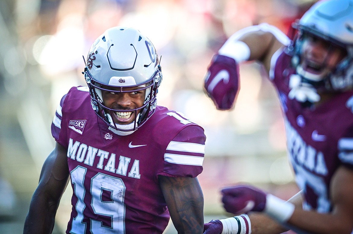 Montana kick returner Malik Flowers (19) celebrates after a 95-yard kickoff return for a touchdown in the third quarter against Cal Poly at Washington-Grizzly Stadium on Saturday, Sept. 25. (Casey Kreider/Daily Inter Lake)