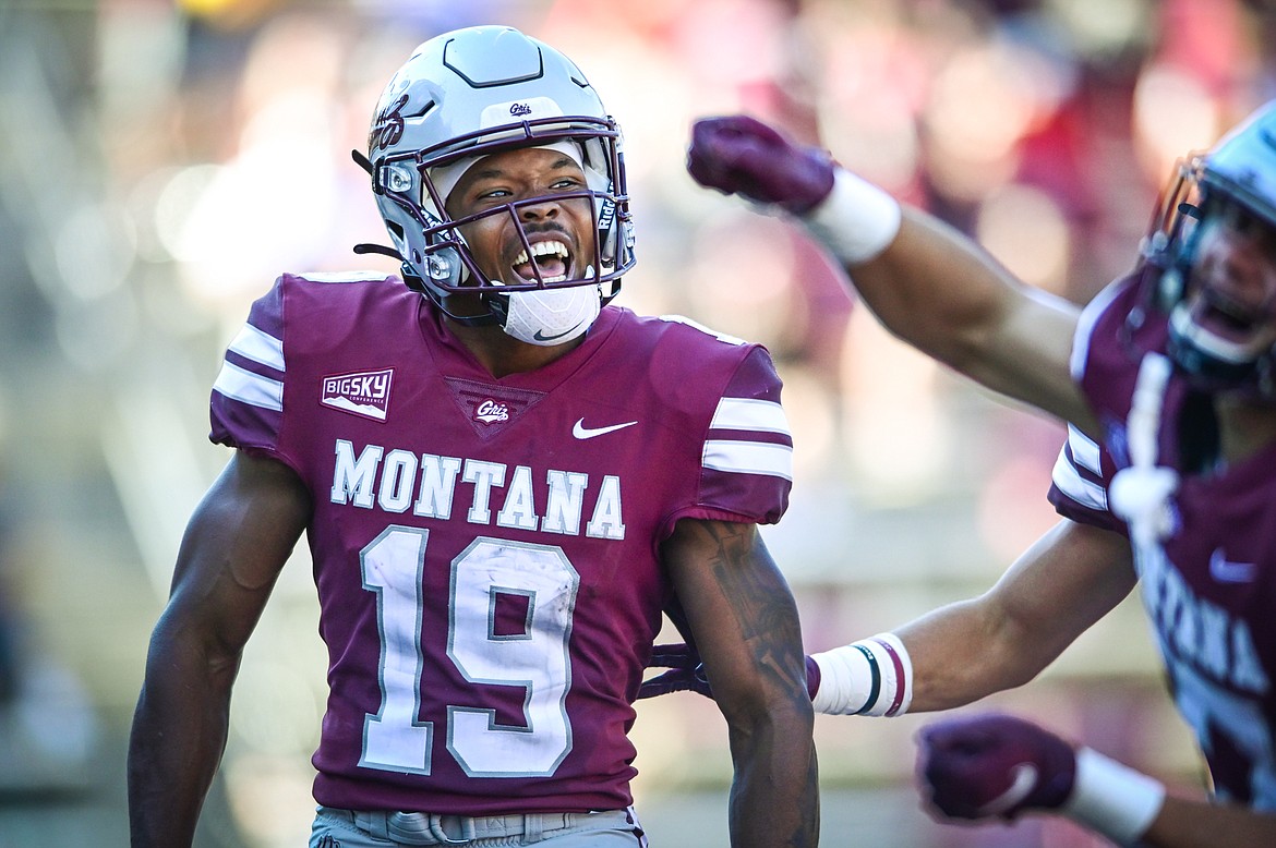 Montana kick returner Malik Flowers (19) celebrates after a 95-yard kickoff return for a touchdown in the third quarter against Cal Poly at Washington-Grizzly Stadium on Saturday, Sept. 25. (Casey Kreider/Daily Inter Lake)