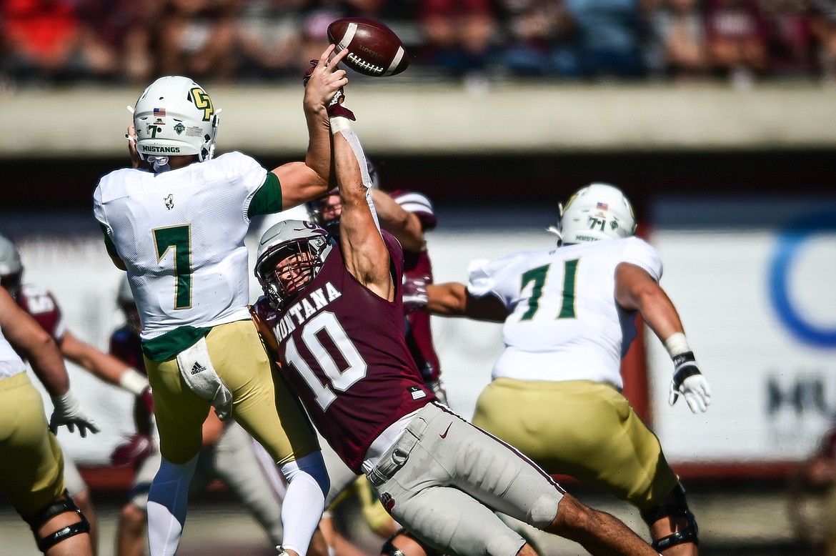 Montana linebacker Marcus Welnel (10) knocks down a pass attempt by Cal Poly quarterback Conor Bruce (7) in the second quarter at Washington-Grizzly Stadium on Saturday, Sept. 25. (Casey Kreider/Daily Inter Lake)