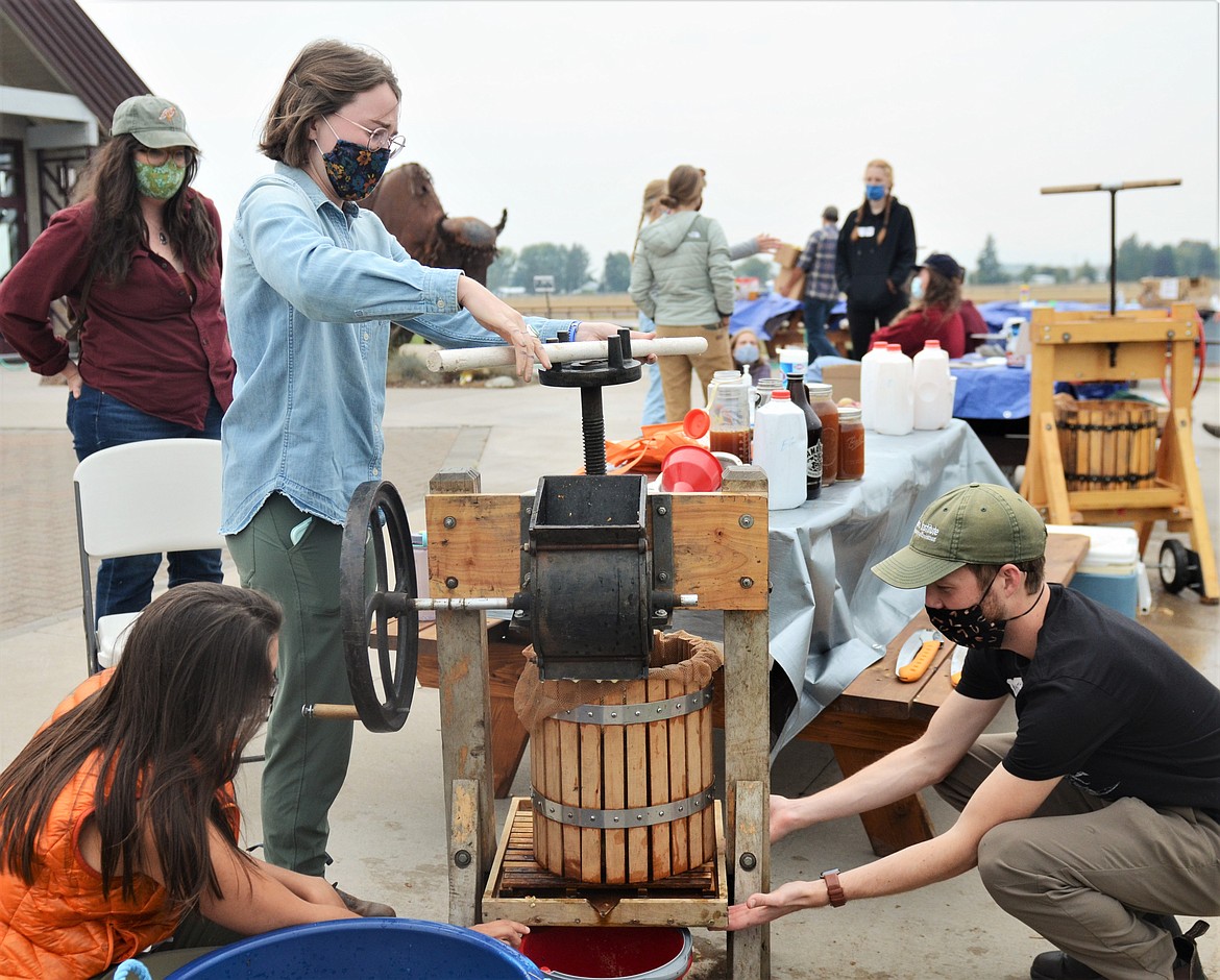 Several apple presses were available to those who attended the Bears and Cider even recently at Salish Kootenai College in Pablo. The event aimed to help reduce human-bear conflicts by harvesting fruit that's an attraction for bears. (Carolyn Hidy/Lake County Leader)