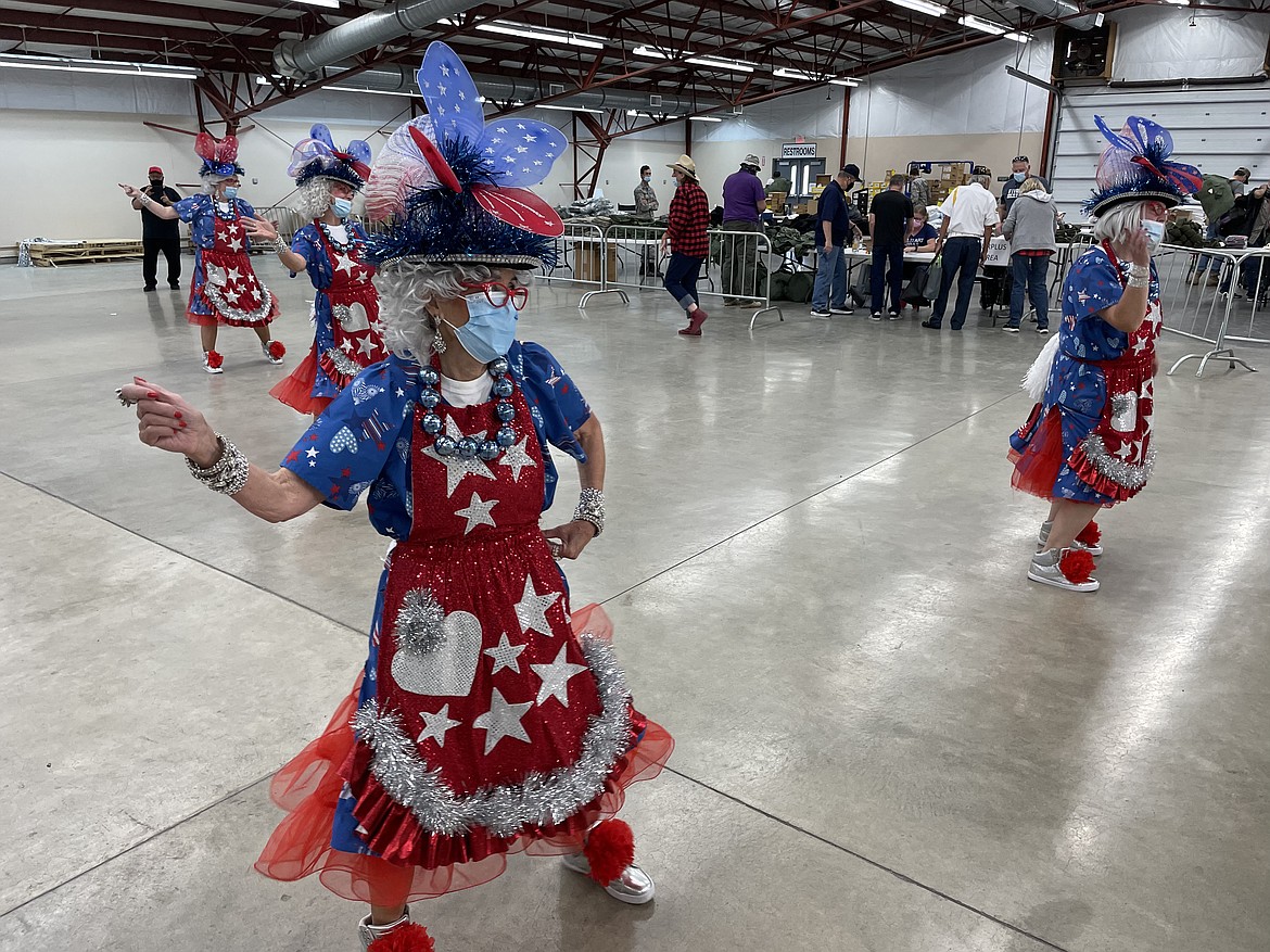 Members of the Red Hot Mamas, a performance group based in Coeur d’Alene, Idaho, dance on Saturday during the annual Veterans Resource and Job Fair at the Grant County Fairgrounds.