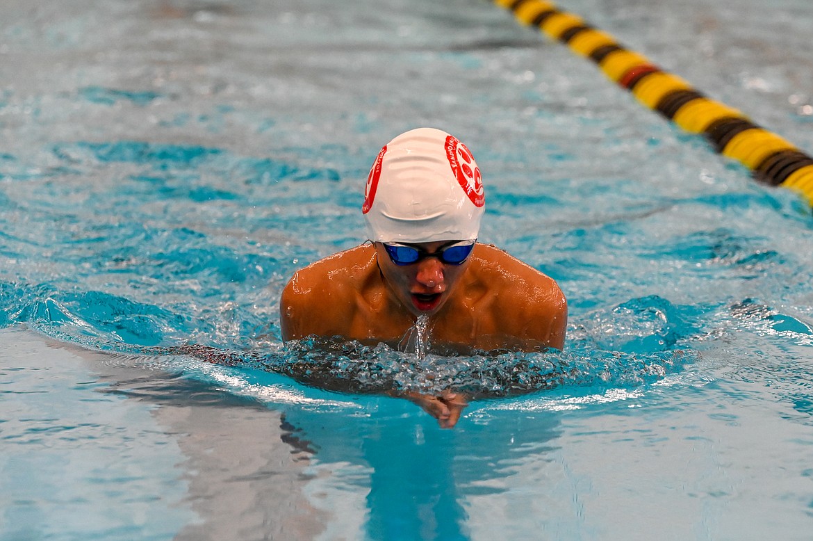 Sophomore Harrison Gedde swims a leg in the 200 medley relay on Saturday.