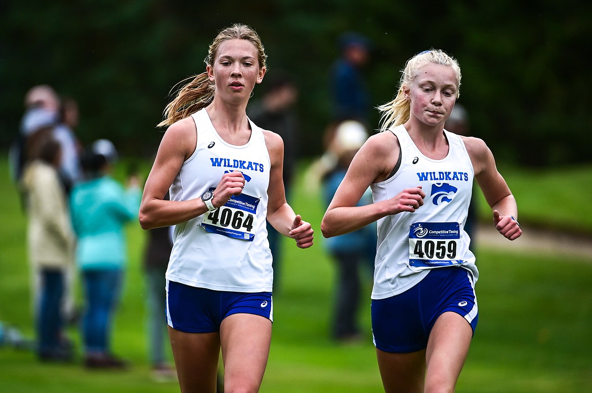 Columbia Falls' Hannah Sempf and Siri Erickson compete at the Whitefish Invite on the South Course of Whitefish Lake Golf Club on Tuesday, Sept. 28. (Casey Kreider/Daily Inter Lake)