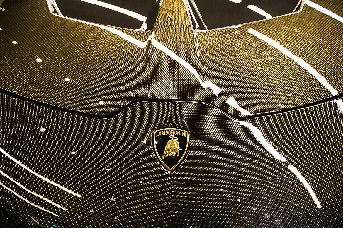 The Lamborghini hood emblem on a Huracan with a gold carbon fiber body kit at SWAE in Columbia Falls on Friday, Sept. 24. (Casey Kreider/Daily Inter Lake)