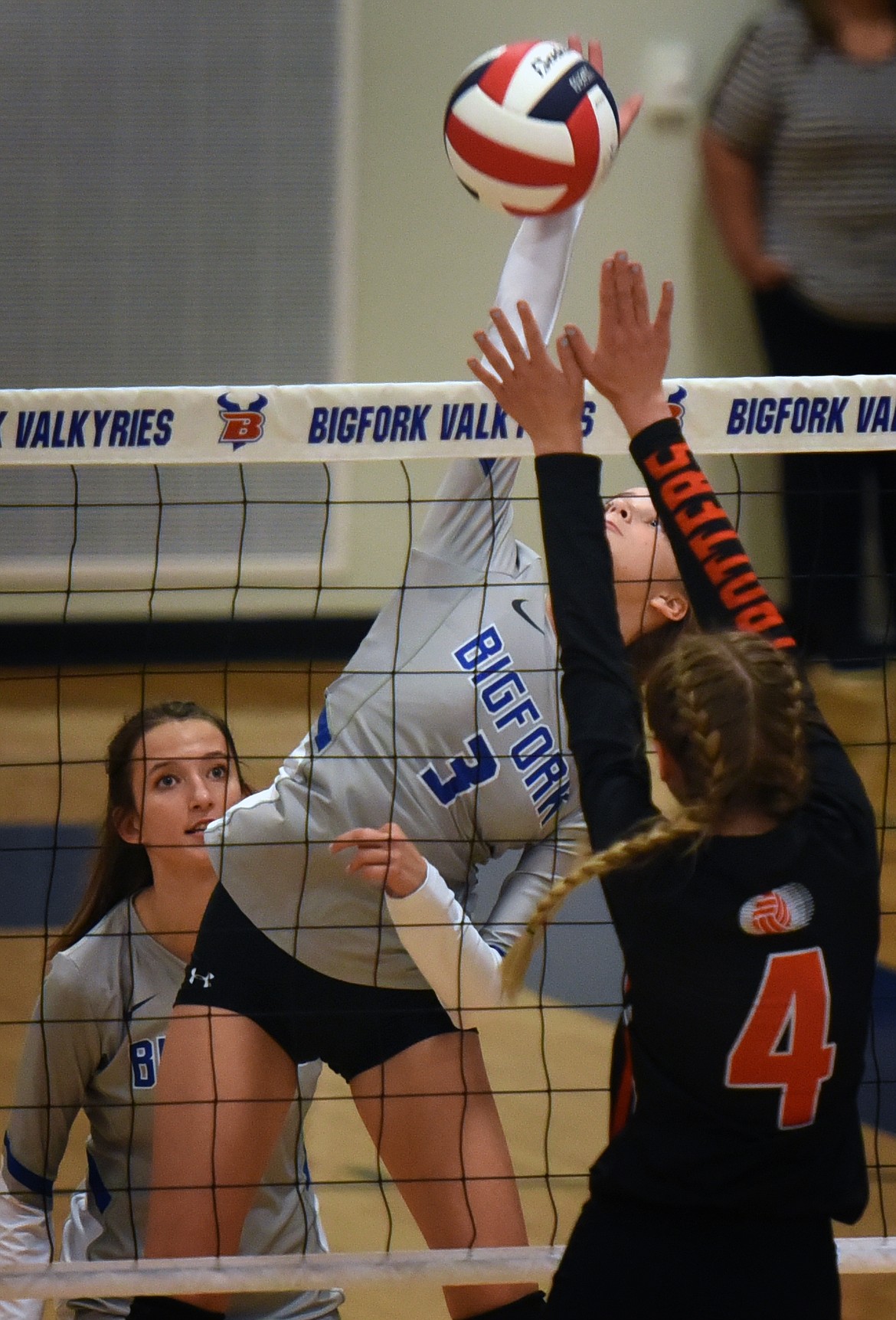 Bigfork's Isabella Ellison sends the ball past Plains defender Kallen Burrows Monday. (Jeremy Weber/Bigfork Eagle)