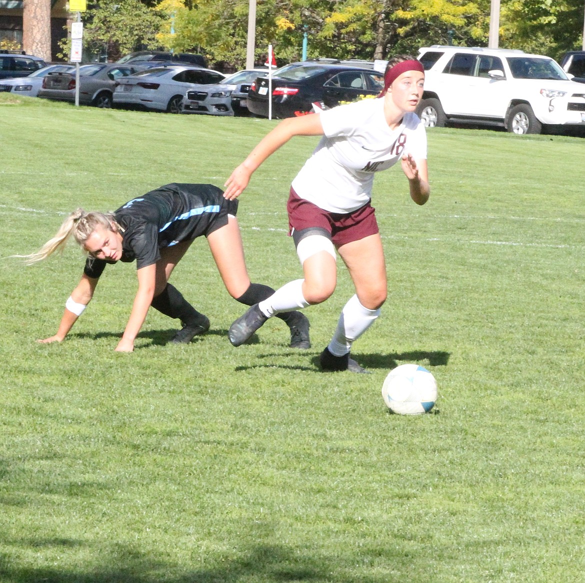 JASON ELLIOTT/Press
North Idaho defender Maddie Kutschkau steals the ball from a Community Colleges of Spokane player during Wednesday's match at Eisenwinter Field in Coeur d'Alene. NIC won the match 2-1 in overtime.