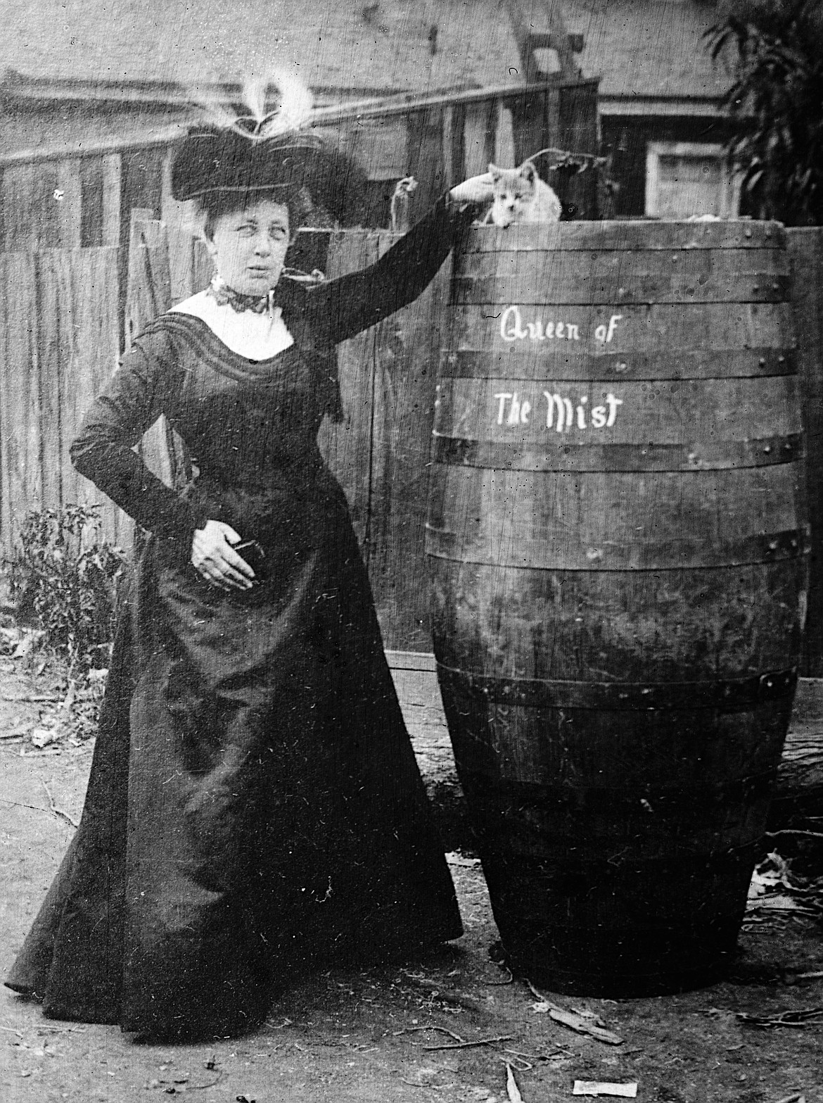 Annie Edson Taylor, first person to go over Niagara Falls in a barrel and survive, cat in photo went over the falls first in a test run (date unknown).