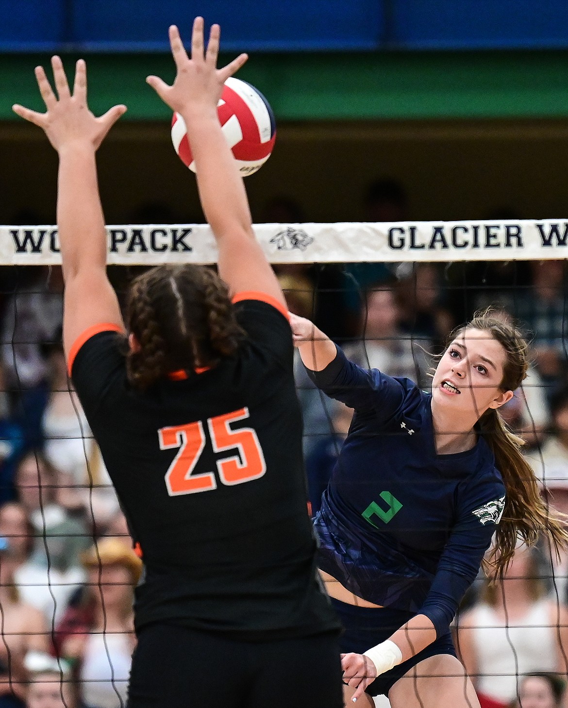 Glacier's Sidney Gulick (2) goes up for a kill against Flathead's Alliyah Stevens (25) at Glacier High School on Thursday, Sept. 30. (Casey Kreider/Daily Inter Lake)