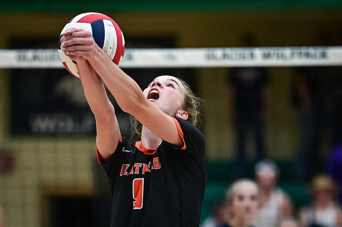 Flathead's Kennedy Moore (9) passes during a crosstown matchup with Glacier at Glacier High School on Thursday, Sept. 30. (Casey Kreider/Daily Inter Lake)