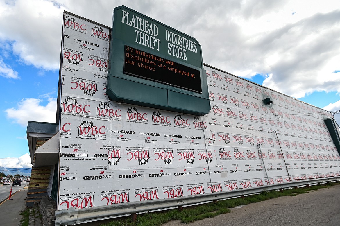 Building wrap on the exterior of the Flathead Industries Thrift Store in Kalispell on Wednesday, Sept. 29. (Casey Kreider/Daily Inter Lake)