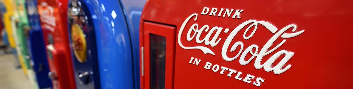 Vintage vending machines line the south wall of Bob King and Colten Harts display room, including Coke machines, Royal Crown Cola and even a milk machine and one that dispenses hot canned foods. (Jeremy Weber/Daily Inter Lake)