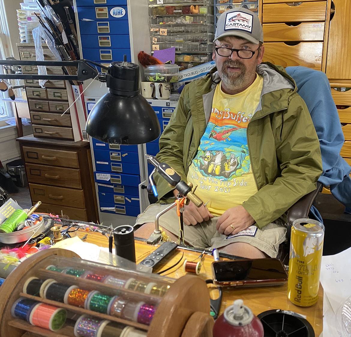 Just another day in the office? It's not so bad when you're Joe Roope, shown here in his full service shop, Castaway Fly Fishing.