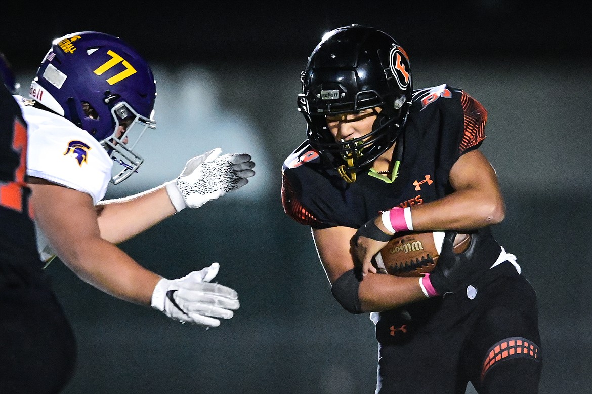 Flathead running back Joe Jones (9) looks for running room against the Missoula Sentinel defense in the second quarter at Legends Stadium on Friday, Oct. 1. (Casey Kreider/Daily Inter Lake)