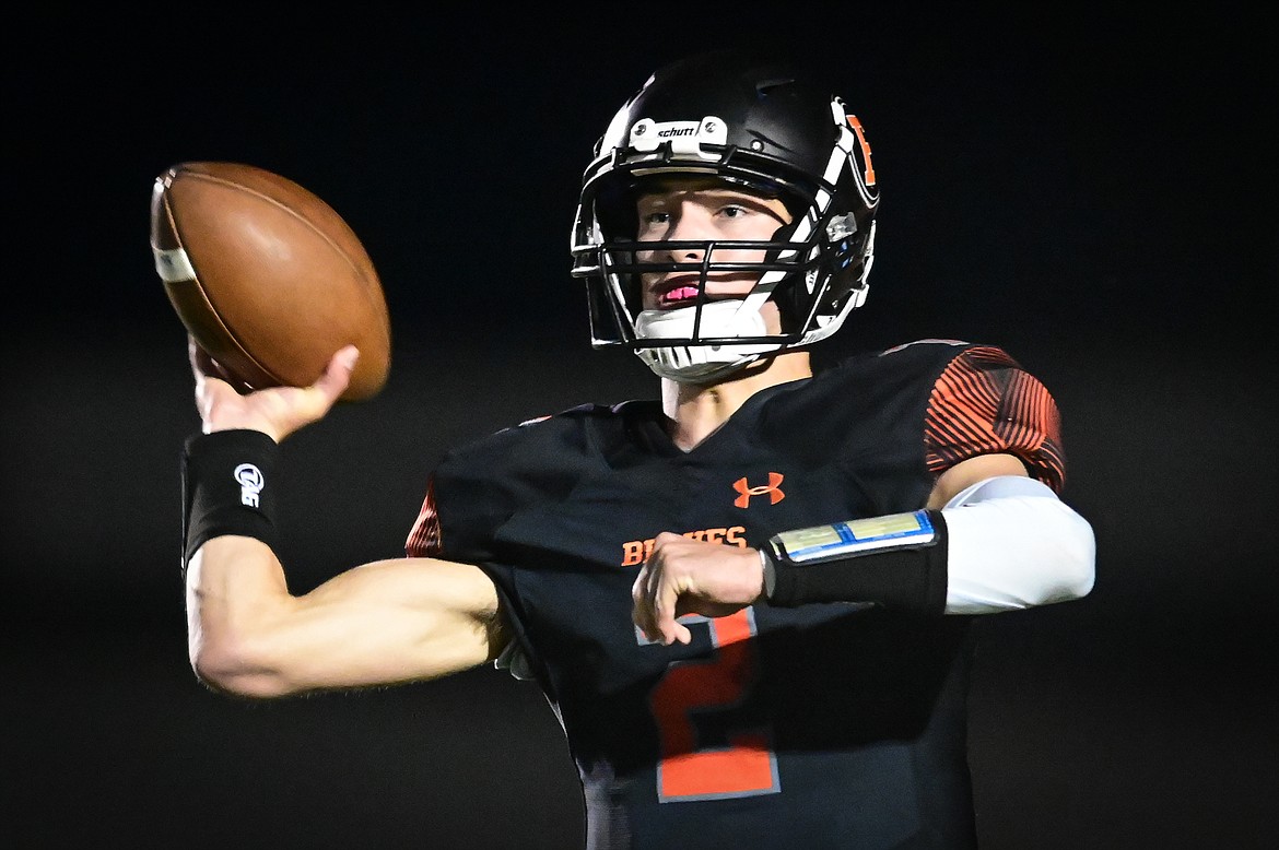 Flathead quarterback Jackson Walker (2) rolls out to pass in the second quarter against Missoula Sentinel at Legends Stadium on Friday, Oct. 1. (Casey Kreider/Daily Inter Lake)