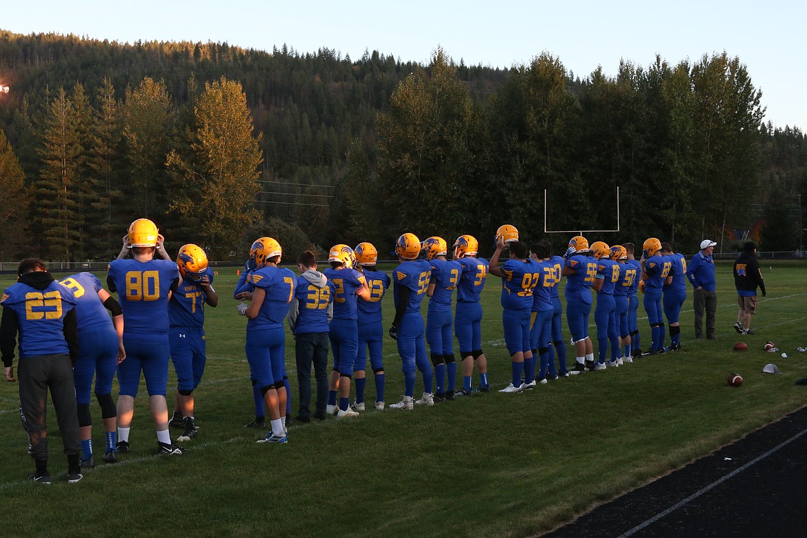 CFHS football team lining up during the national anthem.