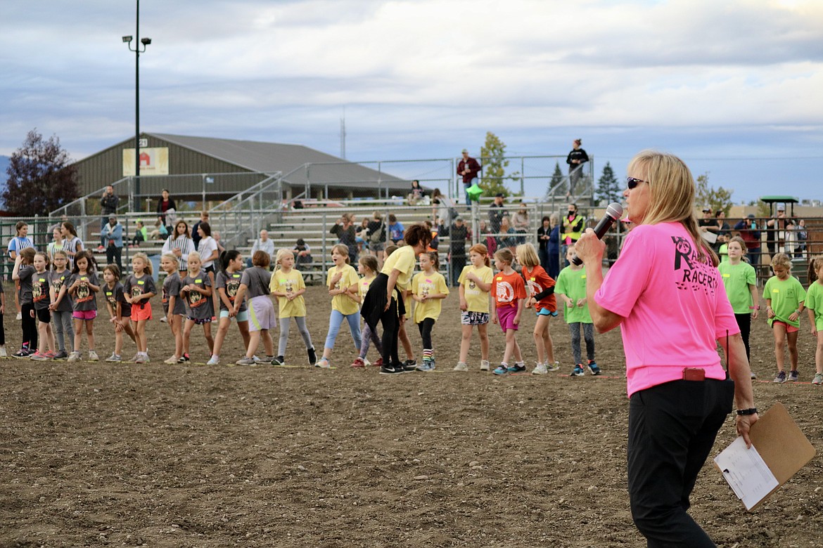 Trena Burt, a teacher at Ramsey Magnet School of Science, has been directing the Coeur d'Alene School District cross-country race for 23 years, resigning from the role after the race Thursday night at the Kootenai County Fairgrounds. HANNAH NEFF/Press