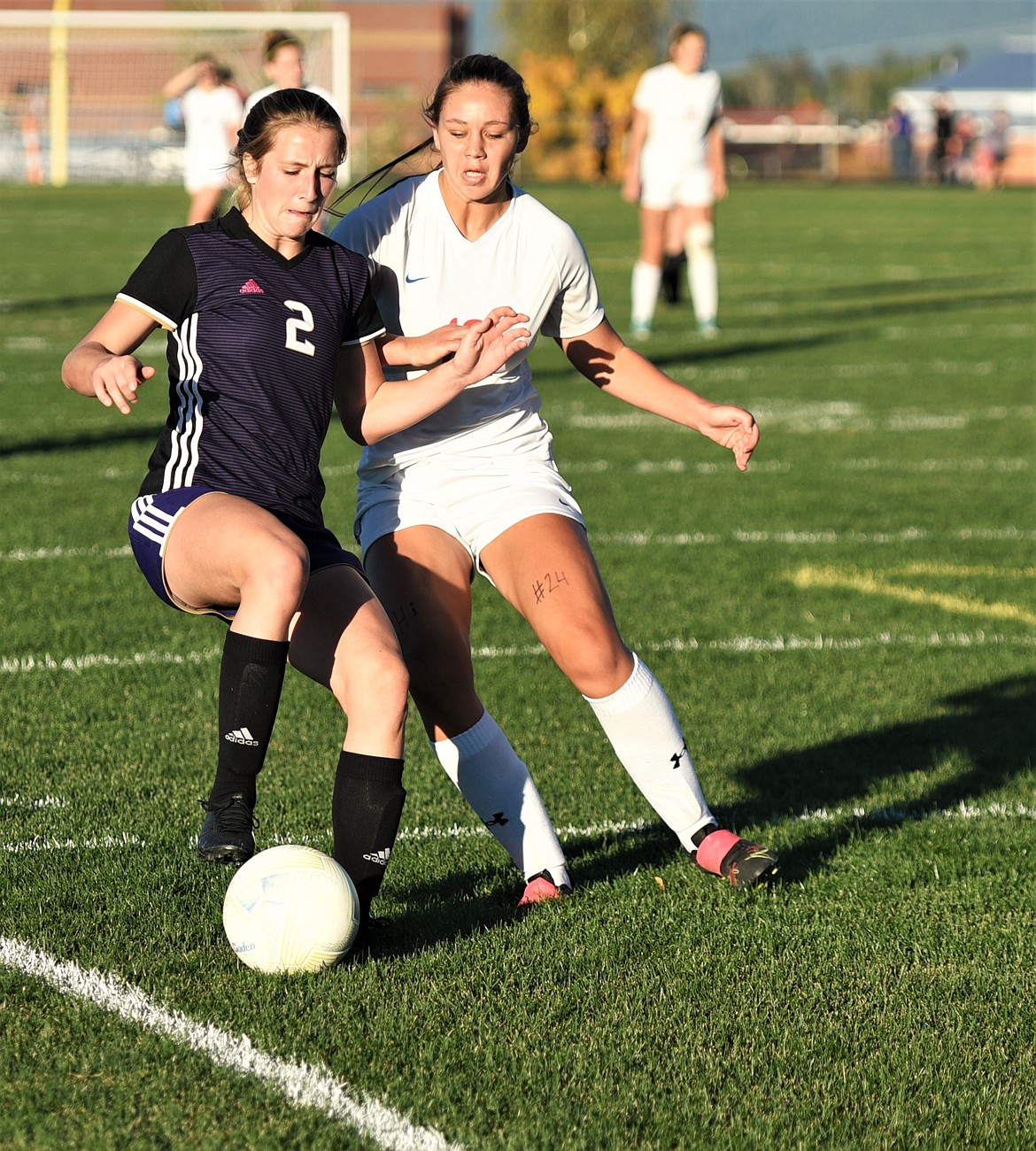 Tia Mercer controls the ball as a Bigfork defender gives chase. (Scot Heisel/Lake County Leader)