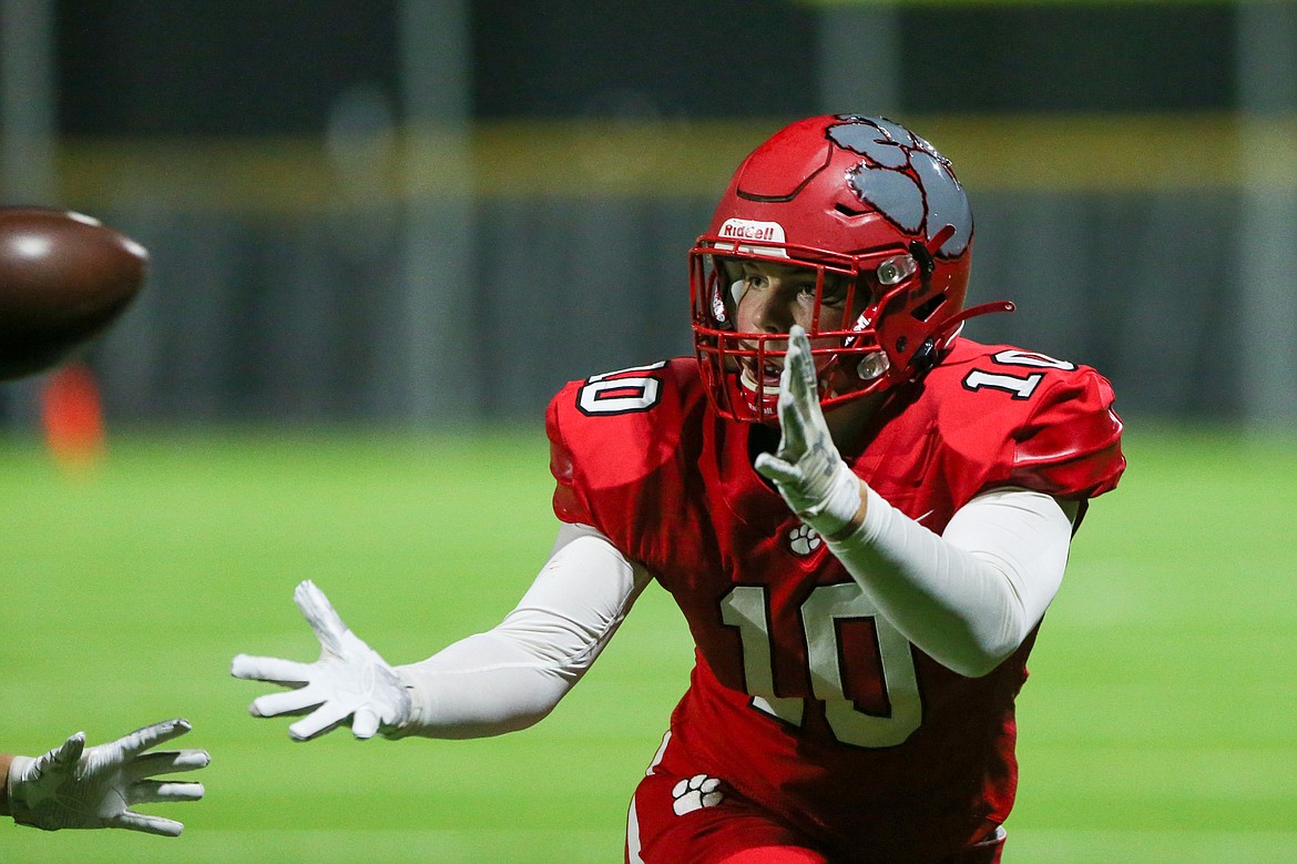 Arie VanDenBerg reels in a catch during Friday's game against Lake City.