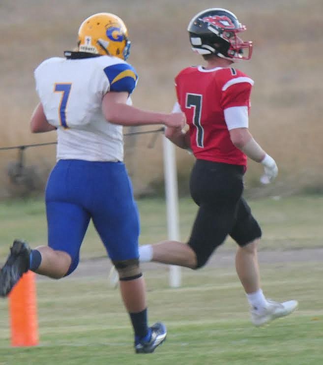 Hot Springs’ Kyle Lawson crosses the goal line on one of his three receiving touchdowns last Friday against Gardiner. The Savage Heat won 58-0. (Adam Lindsay/Valley Press)