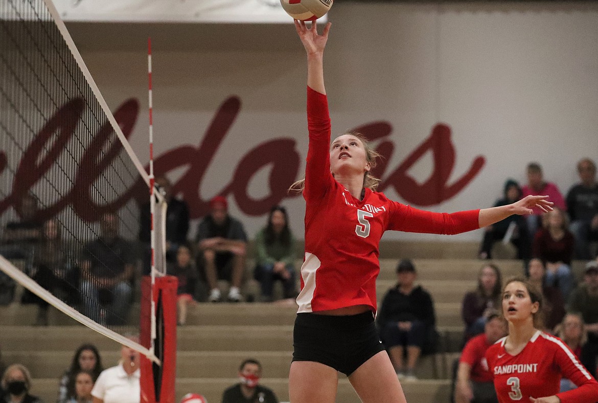 Audrey Sheffler tries to tip the ball over the net on Saturday.