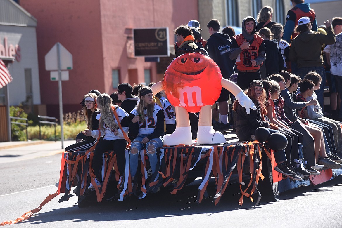 Plains students ride on a float during last Thursday's Homecoming parade. (Scott Shindledecker/Valley Press)