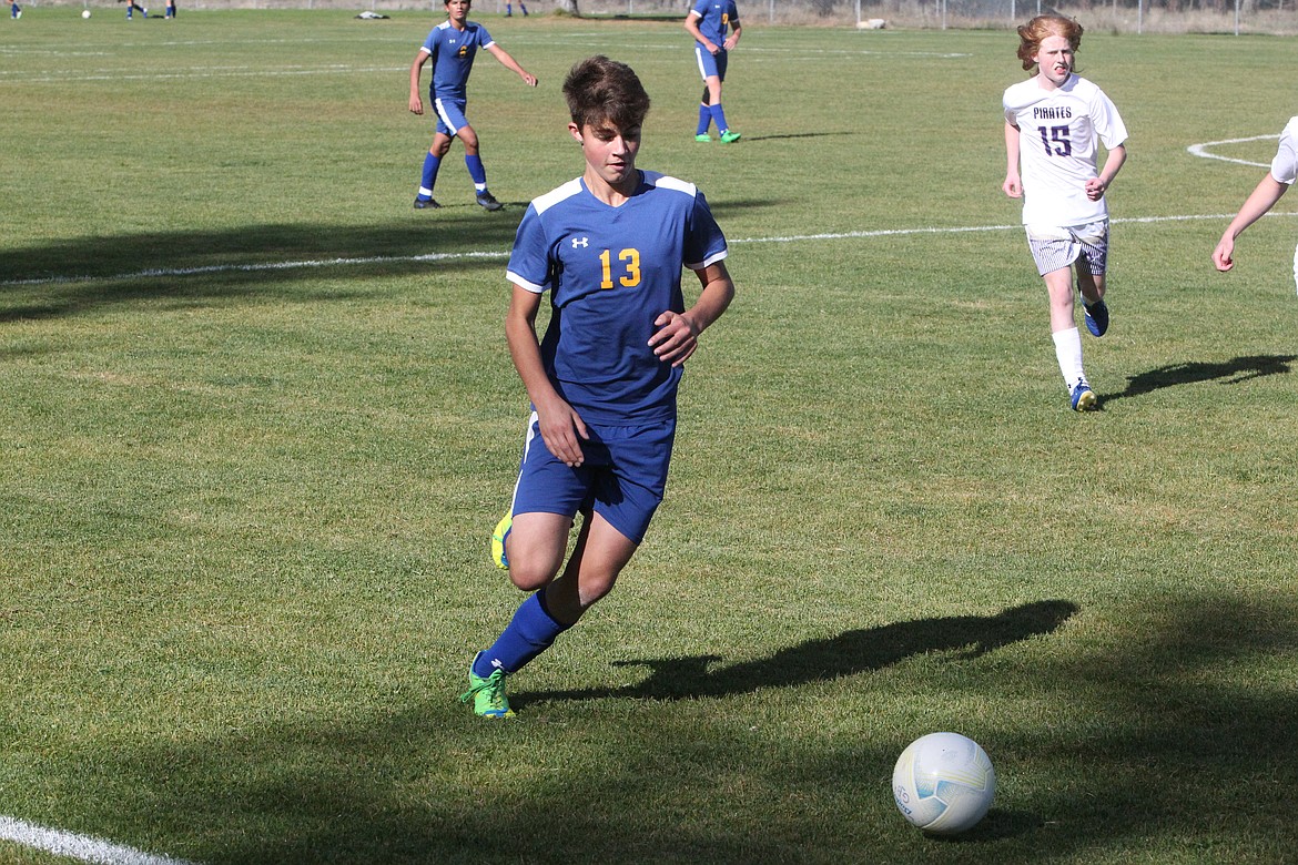 Dylan Warner runs with the ball during an Oct. 2 game against Polson. The Libby boys soccer squad fell 4-2 against the Pirates. Ivan Cano and Sami Jocks each scored for the Loggers. The girls team fell 7-0. (Will Langhorne/The Western News)