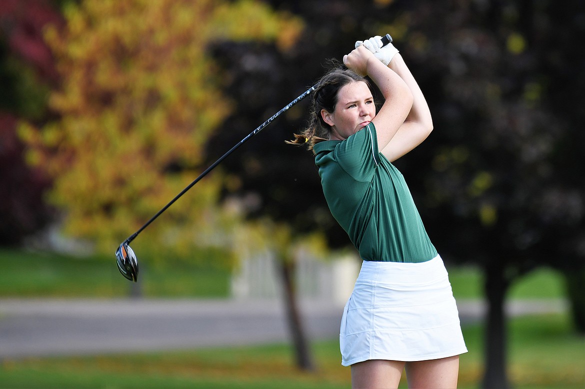 Bulldog Macy Whisenand takes a shot at the State A golf tournament in Polson. (Jeff Doorn photo)