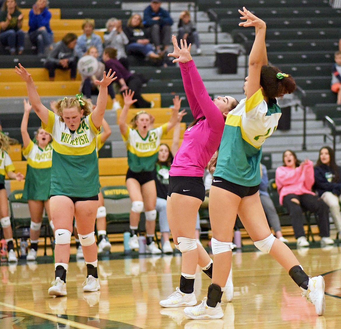 The Whitefish volleyball team celebrates a winning a point after a successful block at the net during a match against Browning on Tuesday, Sept. 28 in Whitefish. (Whitney England/Whitefish Pilot)