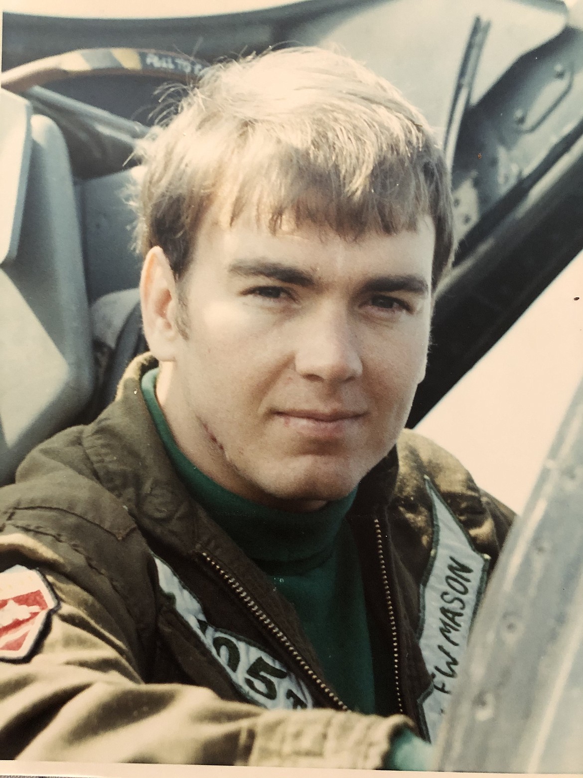 A young Lt. Lew Mason sits in the cockpit of an A-7E Corsair II from the mid-1970s.