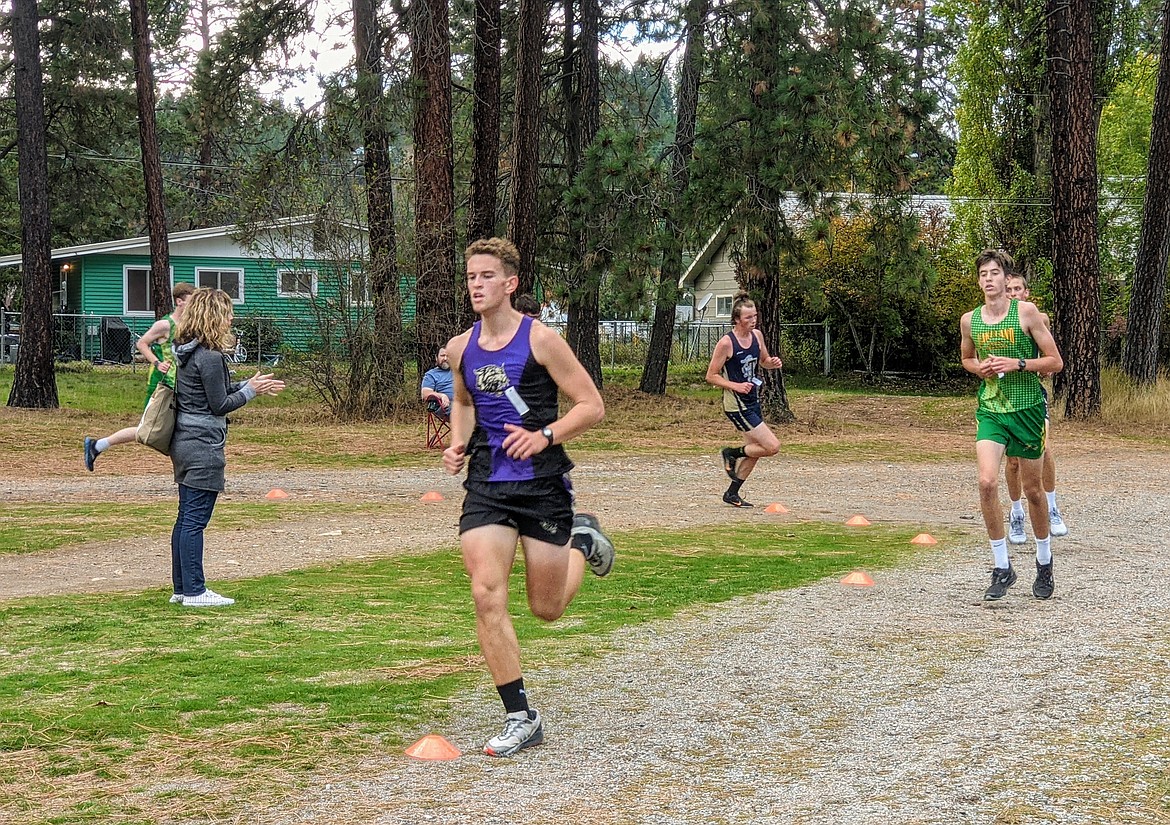 Kellogg runner CO Bergem rounds the corner during the Ben Castro Invitational at Pinehurst Golf Course.