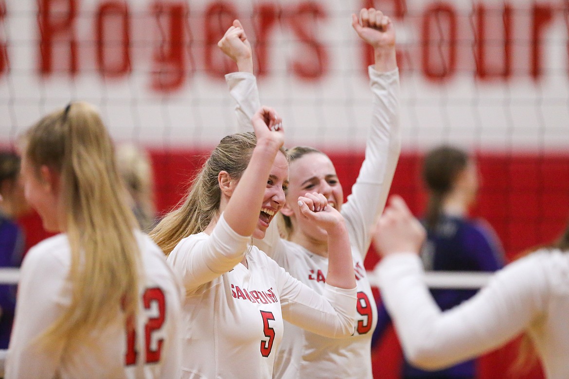 Audrey Sheffler celebrates with her teammates after a point.