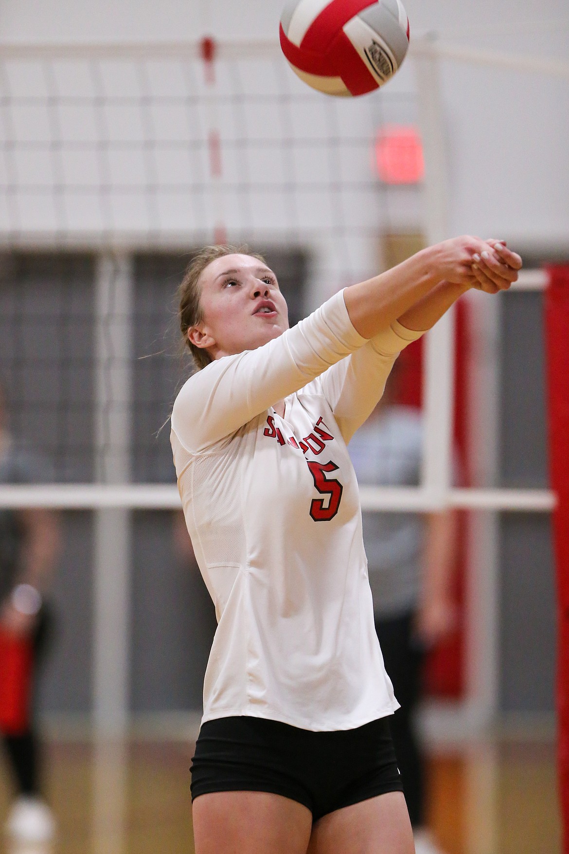 Audrey Sheffler sets the ball for a teammate.