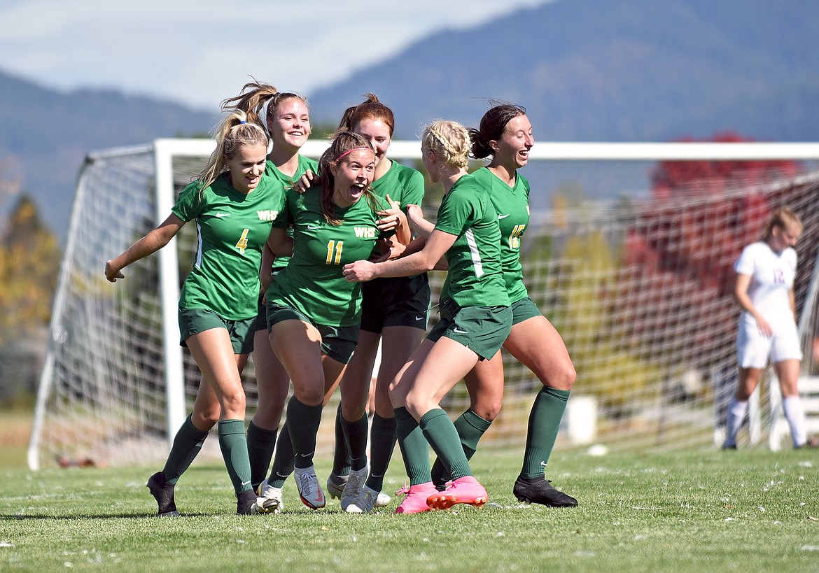 Whitefish senior Emma Barron (11) celebrates scoring a goal direct from a corner kick in the first half against Columbia Falls during a game in Whitefish on Saturday. (Whitney England/Whitefish Pilot)