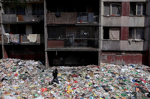 Romani housing in Stolipinovo, Bulgaria, depicting stark contrast of today’s Romani, once traditionally known for high hygienic standards.