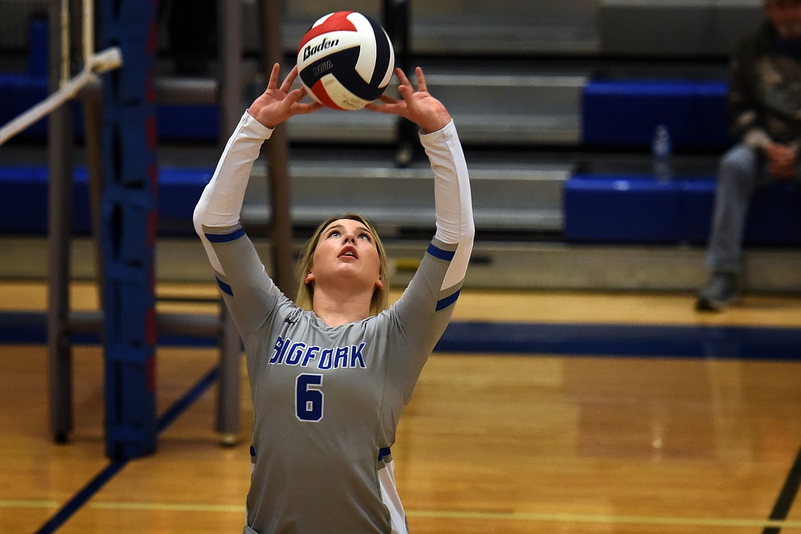 Jessa Newton sets the ball for a teammate against Thompson Falls Saturday. (Jeremy Weber/Bigfork Eagle)