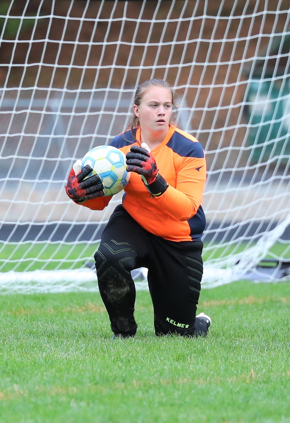 Goalkeeper Brooklyn Best secures a save during a home match against Bonners Ferry on Sept. 28.