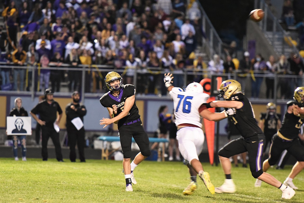 Jarrett Wilson fires off a pass against Columbia Falls. (Scot Heisel/Lake County Leader)