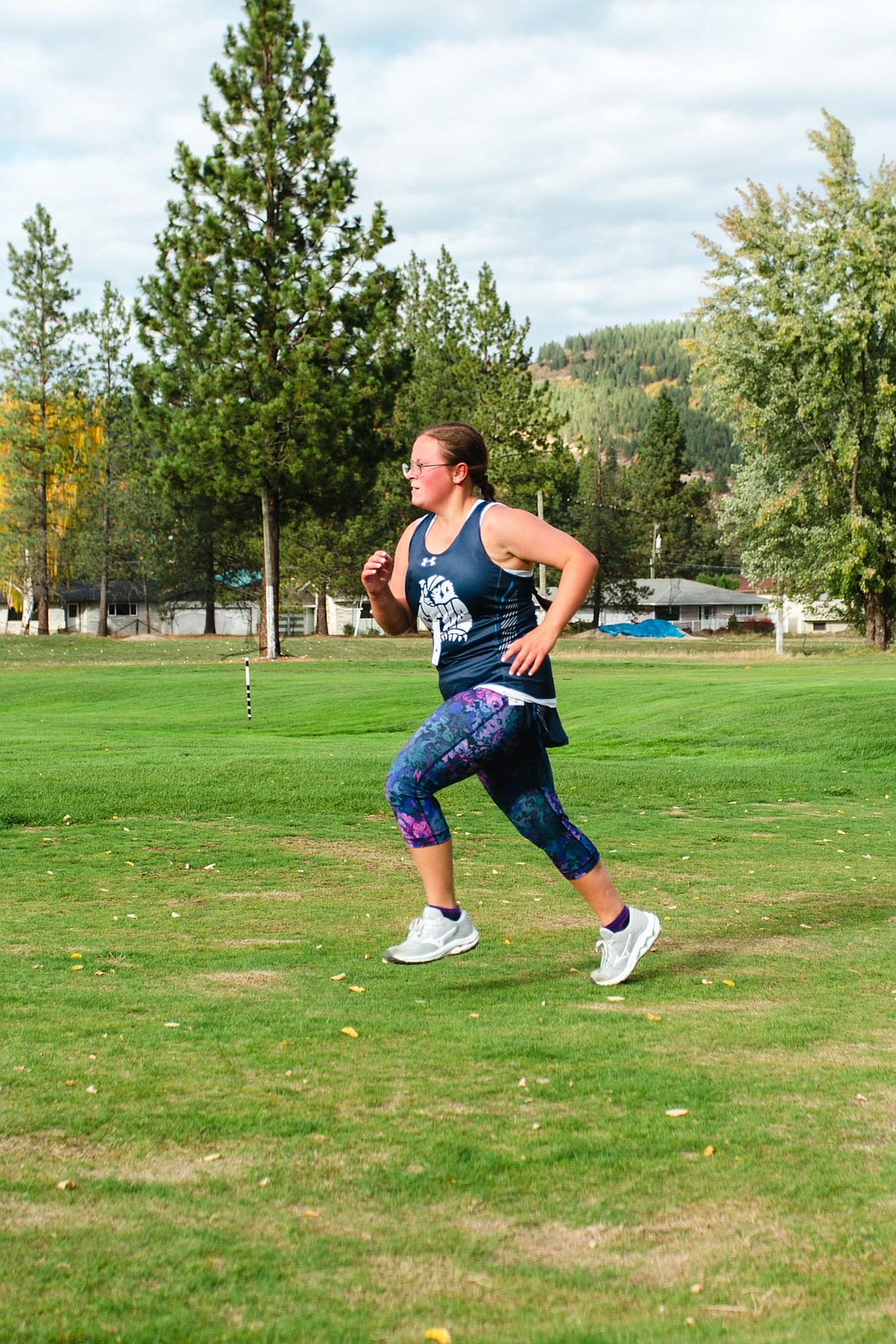 (photo by Camille Ussher)
Pictured: Elizabeth Bourassa racing at the Kellogg Invitational.