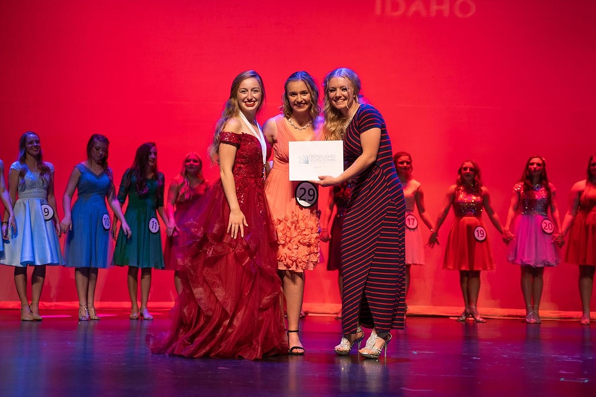 From left, Camille Neuder of Sandpoint, Idaho’s 2021 Distinguished Young Woman, Hailey Black, Kootenai County Distinguished Young Woman and second alternate for 2022 Idaho state, and Elizabeth Spencer, West Jefferson Distinguished Young Woman in 2021 pose for a photo at the 2022 state competition in Idaho Falls the first weekend of October. Courtesy photo