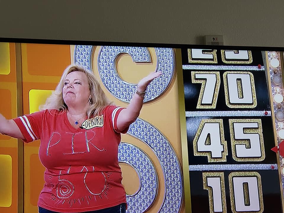 Plains native Debbie Griggs, who now lives in California, spins the "Wheel of Fortune" during a taping of the "Price is Right" game show in September. The show appeared on Oct. 6. (Photo courtesy Debbie Griggs)