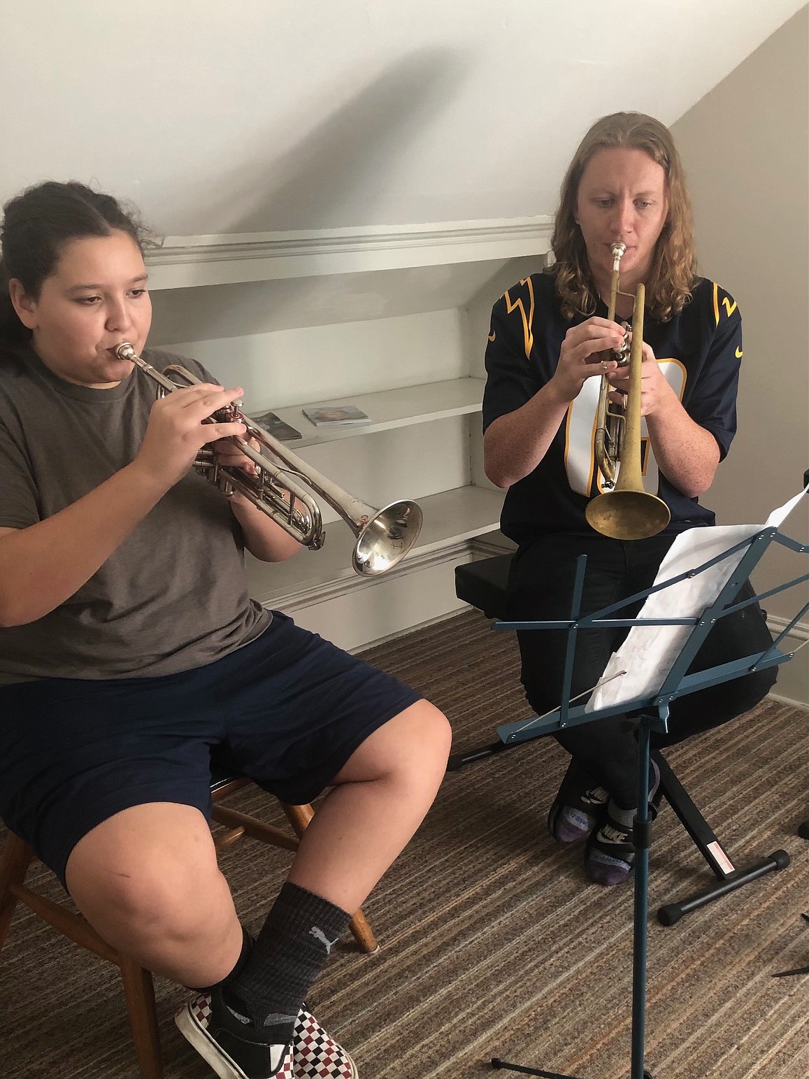 Trumpet student Felix Deady, left, works with instructor Caden Davis at the Music Conservatory of Coeur d'Alene located in the historic Hamilton House on Tuesday. Photo courtesy of Julienne Dance