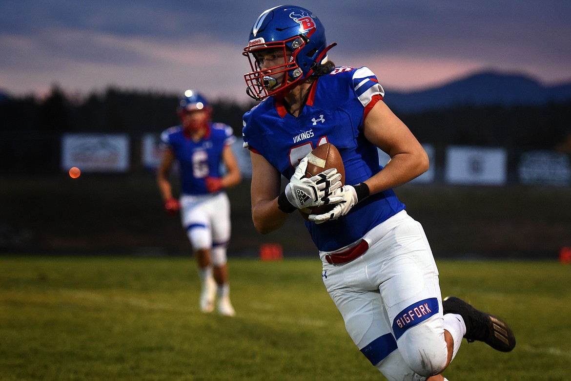 Lineman Jordan Betts returns the opening kickoff for the Bigfork Vikings against Anaconda in Bigfork on Friday. (Jeremy Weber/Daily Inter Lake)